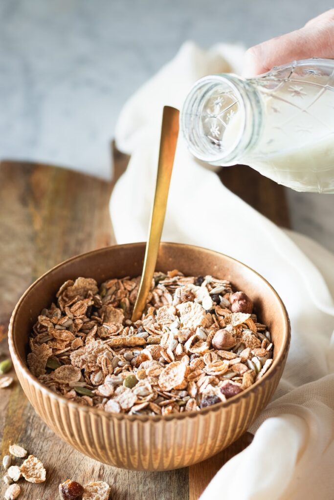 brown and white ice cream in brown ceramic bowl